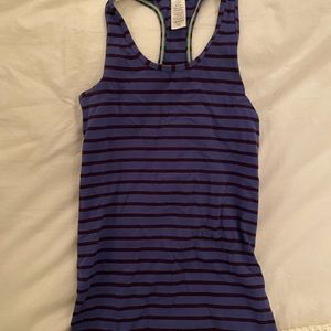 A soft purple striped ivivva tank top.